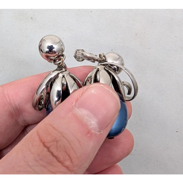 Blue Vintage Signed Napier Cumquat Rhodium Plated Blue Moonglow Resin Drop Clip Earrings-2 Pieces For Sale - Image 8 of 9