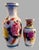 Pair of Hand-Painted Chinese Export Porcelain Vases – Mid-20th Century A complementary pair of mid-20th century Chinese...
