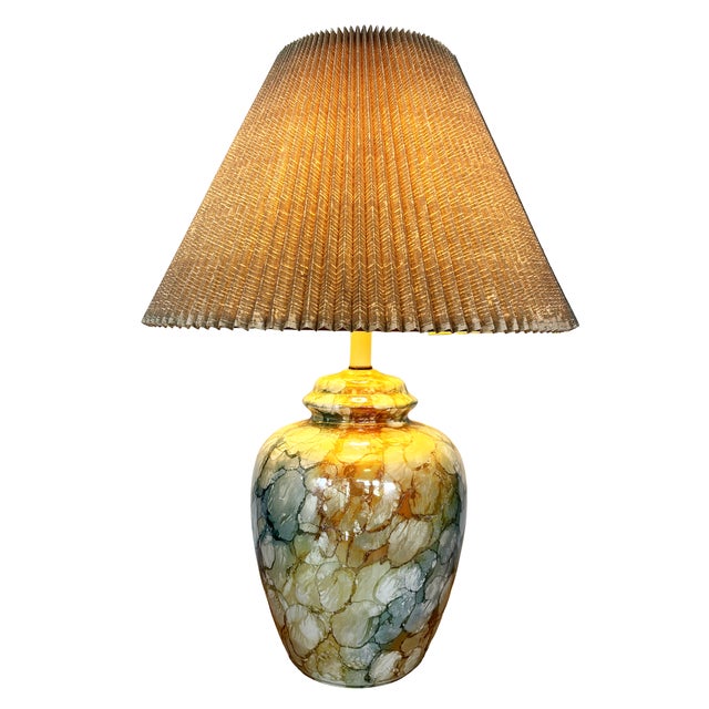 Add a vibrant pop of color and charm to your space with this vintage glazed ceramic table lamp in a ginger jar silhouette,...