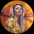 This circular oil painting on copper features a young woman with striking features, set against a vibrant orange...