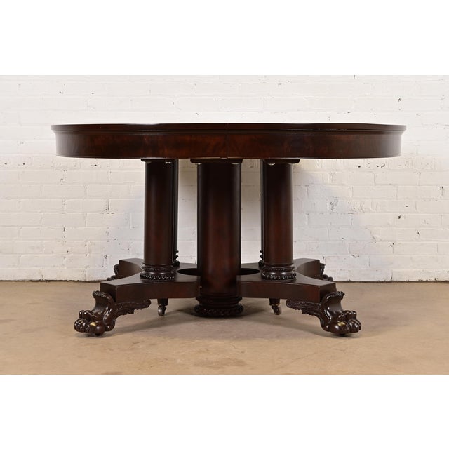 An outstanding antique Victorian or American Empire split pedestal extension dining table By George C. Flint Co. USA,...