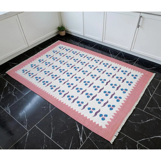 This one-of-a-kind Oushak flat weave, handmade in 2024, represents a contemporary masterwork of West Anatolian craft....