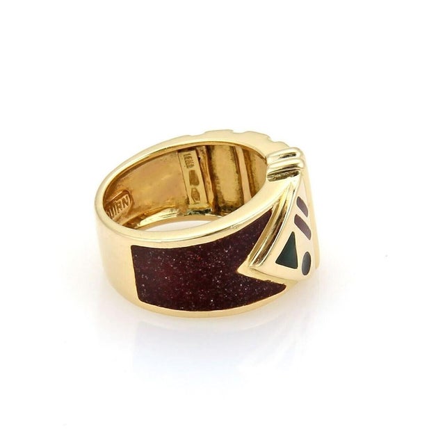 The Gucci Metropolitan Enamel 18k Yellow Gold Band Ring is a limited edition piece of fine jewelry. This ring, signed by...