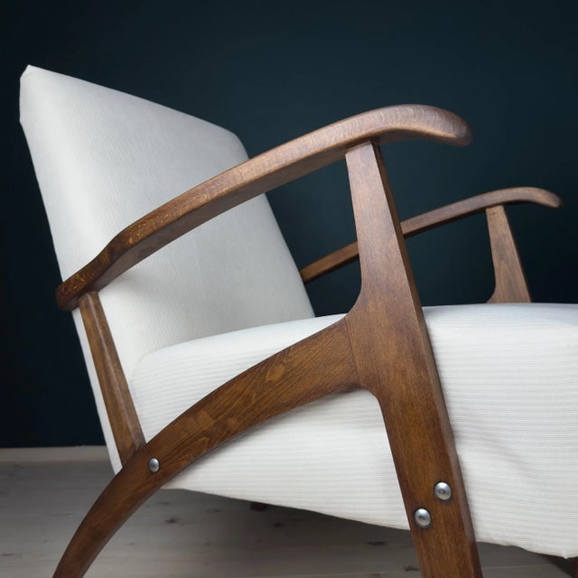 Beautiful pair of vintage armchair made in Yugoslavia in the 1970s. Very good condition. Updated upholstery. Dimensions:...