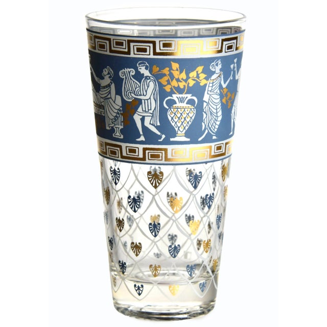 Assorted set of six midcentury highball glasses and two DOFs (double whiskey tumblers), embellished with whimsically...