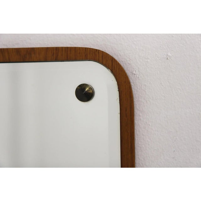 Vintage Danish mirror from the 1950s, teak frame with metal fixings, W. 45 H. 87 D. 1.5 cm. Dimensions: Width: 45 cm...