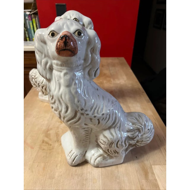 A Fine Pair of Antique Decorated Staffordshire dogs, circa 1860's Made in the Staffordshire district of Stoke on Trent,...