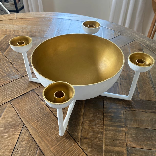 Anyon Atelier Hamish Centerpiece made of steel. A hemisphere rests on a hammered cross terminating in candlesticks. 4...