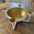 Anyon Atelier Hamish Centerpiece made of steel. A hemisphere rests on a hammered cross terminating in candlesticks. 4...