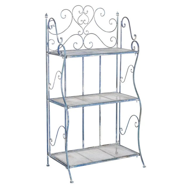 Bring charm and character to any outdoor room or garden with this beautiful Torus Shelf. Designed with elegant iron...