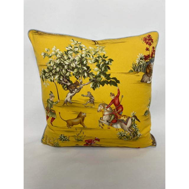 Fun and bright royal animal pillow Covers from Fabricut. Shows images of guards with firearms riding on the backs of...