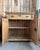 This small antique solid pine sideboard embodies the simple and authentic charm of antique furniture. With its clean lines...