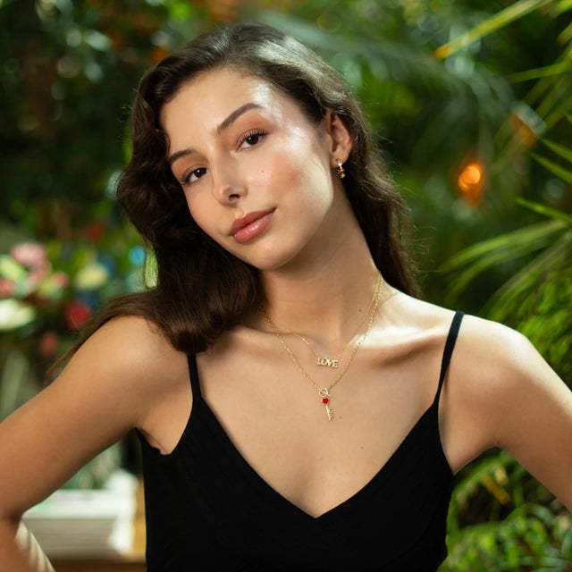 Celebrate romance and passion with the Key to Love Red Enamel Gold Necklace. Handcrafted from sterling silver and plated...