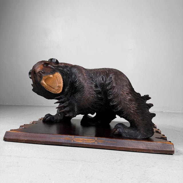 Expressive Japanese wooden bear sculpture, inspired by the Ainu tradition from Hokkaido. Dimensions: height 30 cm, width...