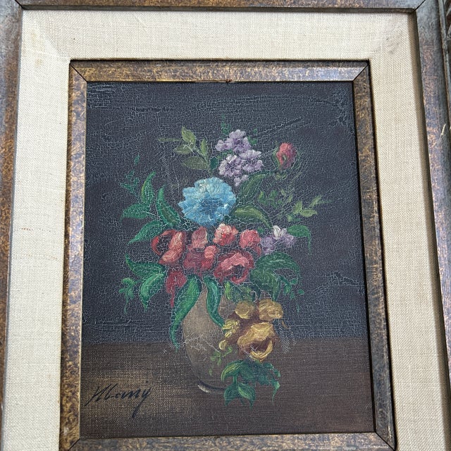 1950’s traditional bouquet of flowers still life painting on canvas. Signed and framed. Painting has visible cracking...