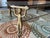 The androgynous figural cast iron Gueridon coffee table after Alberto Giacometti is a stunning piece of mid-century modern...