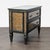 Theodore Alexander “Venetian Art Deco” two-drawer chest featuring handcrafted verre églomisé mirrored panels with an...