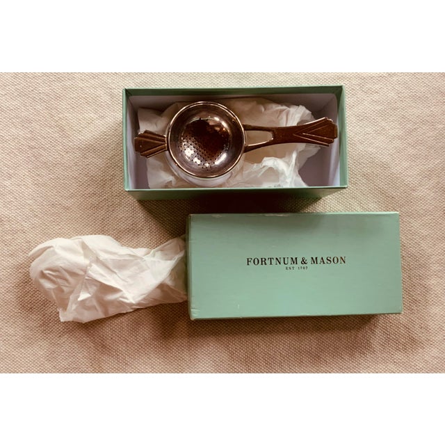 Fit for a Queen: Timeless Elegance from Britain's Most Prestigious Grocer For your consideration, a truly sassy silver...