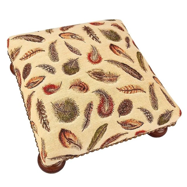 Tapestry Footstools with bun-feet and traditional-style studding.
