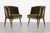 A striking pair of Harold Schwartz lounge chairs, circa 1950s, embodying the sculptural elegance and refined craftsmanship...