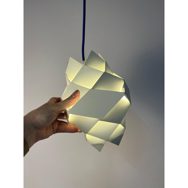 This Symfon lamp series is an absolute design rarity of Scandinavian Mid-Century Modernism. This ingenious classic was...
