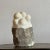Hand carved marble sculpture by tom von kaenel dimensions: d14 x w18 x h26 cm materials: marble this piece is attributed...