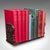 This is a vintage elephant motif book slide. An Anglo-Indian, teak home library stand, dating to the Art Deco period,...