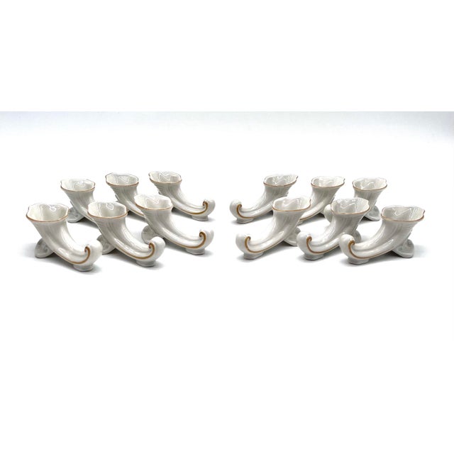 This set of 12 elegant knife rests from the Oscar Schlegelmilch porcelain manufactory (Lanwiesen, Thuringia) captivates...