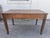 Table, writing desk, directory in walnut wood from the first half of the 19th century. Saber legs, central chest of...