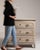 A classic French chest of drawers with a clean, understated façade and balanced proportions. The multiple drawers provide...