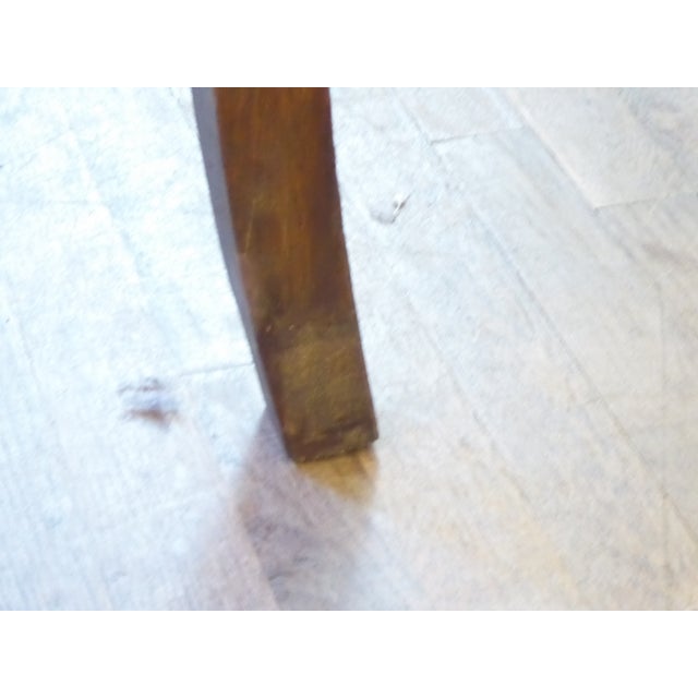 This weathered French dining table seats 4-6 and has a dovetailed drawer, and pegged construction.