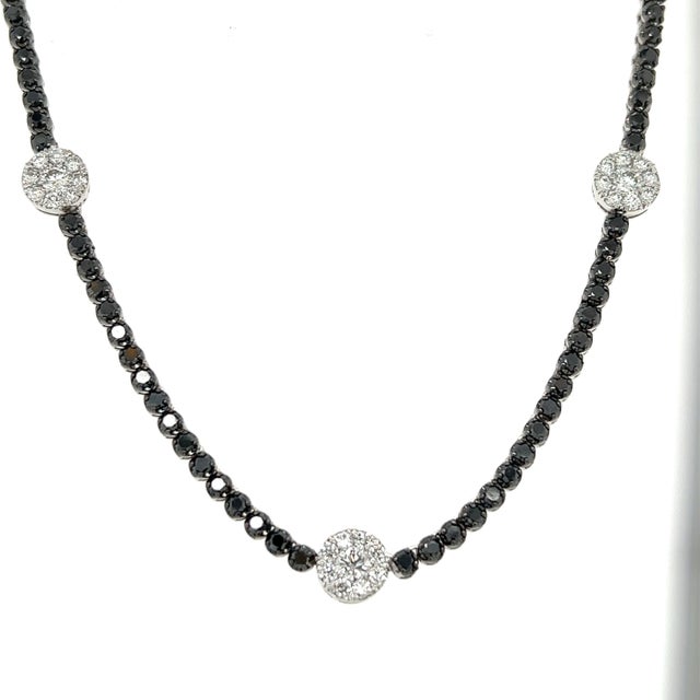 This beautiful necklace has Natural Black Diamonds that weigh 3.05 carats and also Natural Round Cut White Diamonds that...