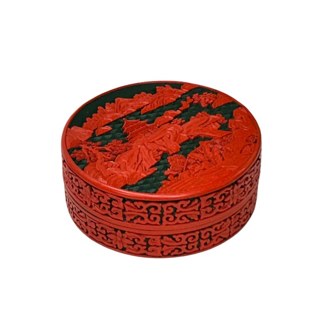Enhance your home decor with this exquisite round accent box, beautifully crafted with intricate carved lacquer detailing...