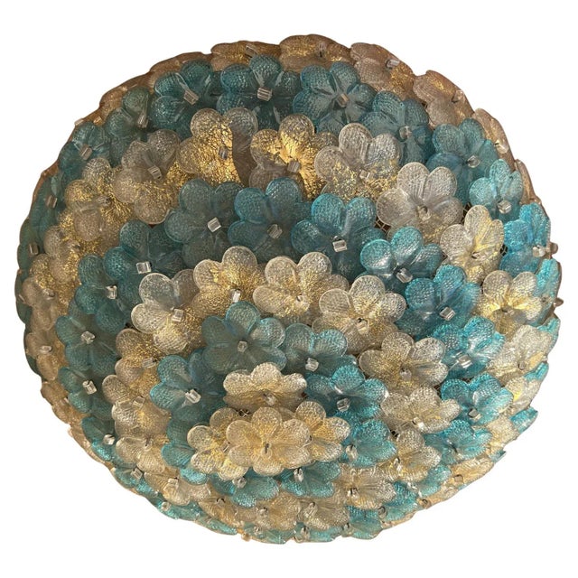 Wonderful Set composed of three marvelous lights from the renowned Murano furnace Seguso. The ceiling light has a diameter...