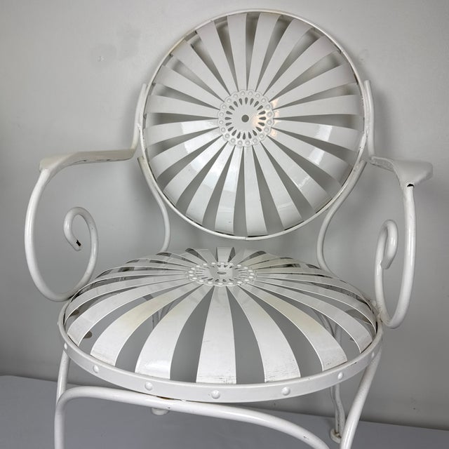 Beautiful Francois Carré style arm chair. Very sturdy steel construction. The design is reflective of the 1930s.