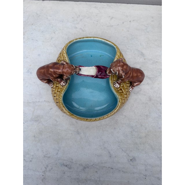 19th Century Majolica Dogs Dachshund sharing a shoe Bowl signed Villeroy & Boch. Rare piece.