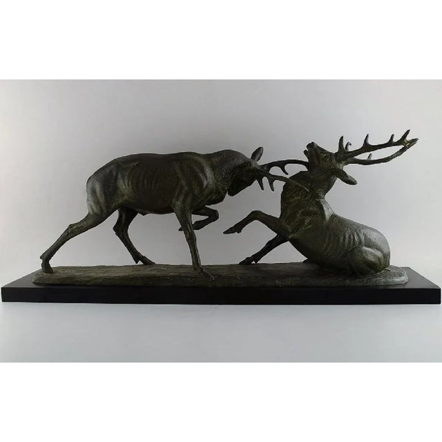 Irénée Rochard (1906-1984), France. Colossal sculpture in patinated bronze on a marble base. Fighting deer. Mid-20th...