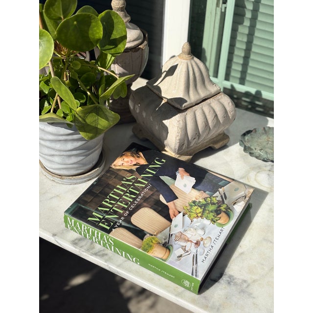 hardcover edition of Martha’s Entertaining: A Year of Celebrations by Martha Stewart. Filled with photography,...