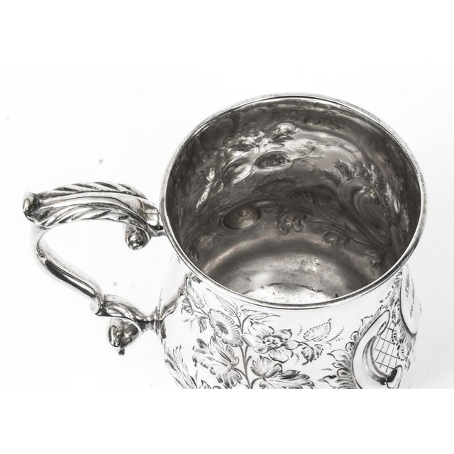 This is a delightful antique Victorian English silver plated engraved and embossed mug, circa 1870 in date. Condition: In...