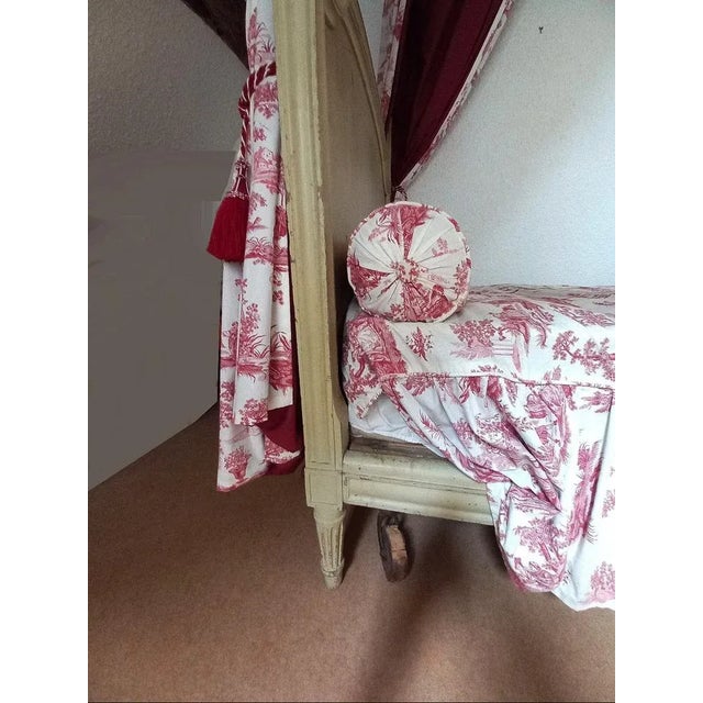Louis XVI period canopy bed, white lacquered woodwork, fuchsia raspberry lined toile de Jouy drapery in excellent...