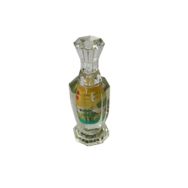 This piece of art features a mesmerizing glass bottle vase adorned with intricate Chinese-inspired oriental scenery. The...