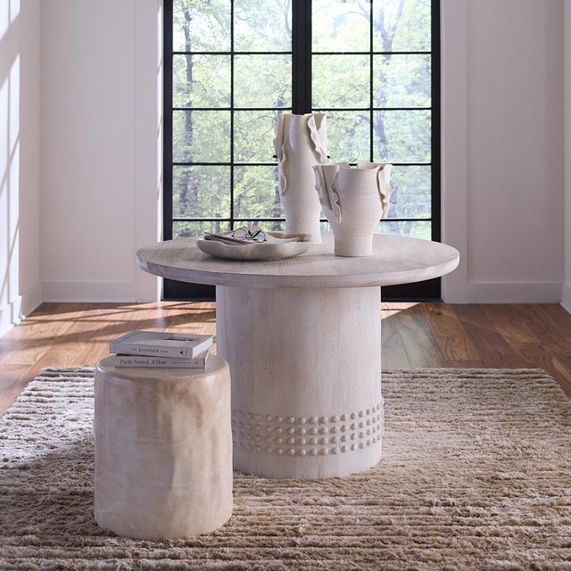 Studded Bistro Dining Table, White Washed Wood The casual, clean finish of these sand-blasted mango wood tables lightens...