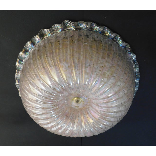 Vintage Italian flush mount or wall light with a round Murano glass shade enclosed in opalescent pearl color / Made in...