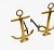Pair of anchor-shaped andirons in polished brass with black iron stand by puritan. Made in USA, circa 1940..Perfect for...