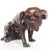 A pair of art deco, patinated bronze dogs in different positions with differing characterisation dimensions: h 10cm, w...