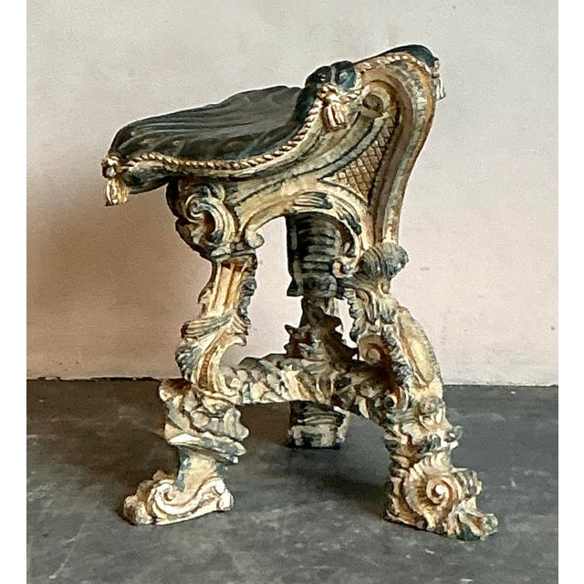 Elevate your space with this captivating vintage low stool, a true statement piece that embodies the opulence of the...