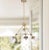 a unofficial design landmark, this modern pendant is a unique and artistic focal point. Designed to create a warm glow in...