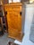 Antique Biedermeier Style Tall Cabinet. Flame and Burl Birch with Carved and Ebonized Column Caps and key holes. Concave...