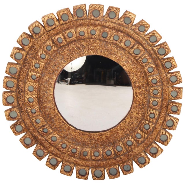 A stunning convex mirror featuring hand painted glass inlays. This mirror is one of a kind drawing influence from Line...