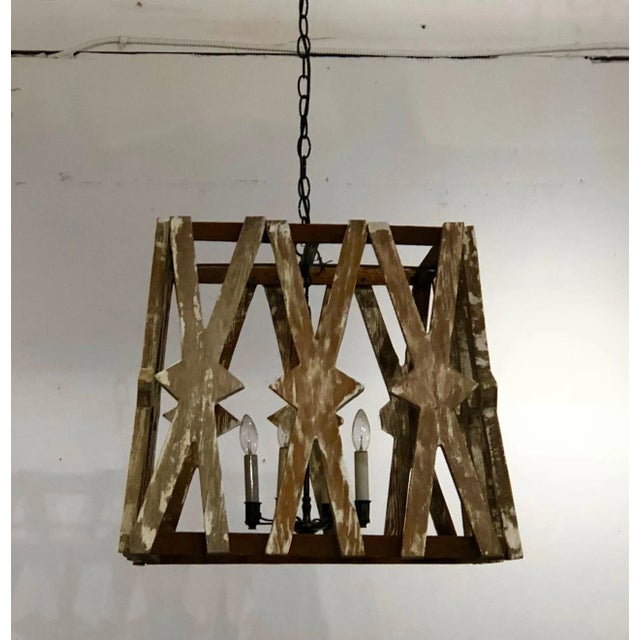 Reclaimed pine, hand cut into cross shapes 4 lights chain adjustable 20.25" tall 21.25" square at top 23.25" square at base